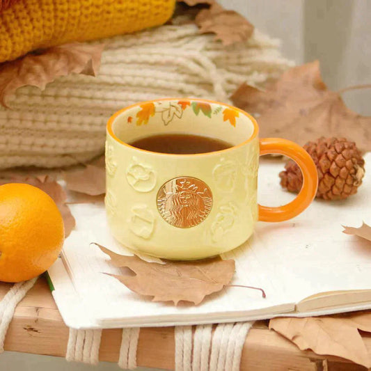 Experience the Fall Vibes with Starbucks: Embossed Maple Logo Mug - Ann Ann Starbucks